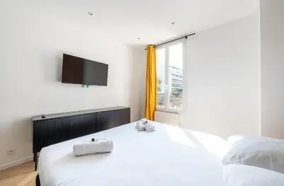 Un ou plusieurs lits dans un hébergement de l'établissement Mobility lease l Neuilly l Equipped & Paris 10mins away