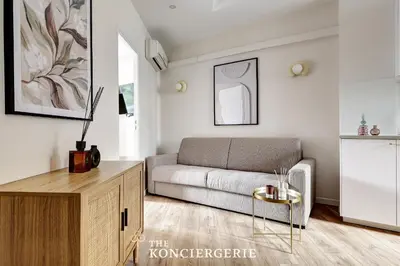 Coin salon dans l'établissement Appartement refait à neuf Pour 6 Personnes à Levallois