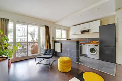 Cuisine ou kitchenette dans l'établissement 2P cosy avec terrasse à Neuilly - proche La Défense