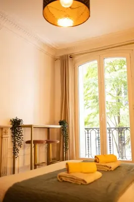Un ou plusieurs lits dans un hébergement de l'établissement Le Montrouge BEL APPARTEMENT CONFORT GLAM CHIC