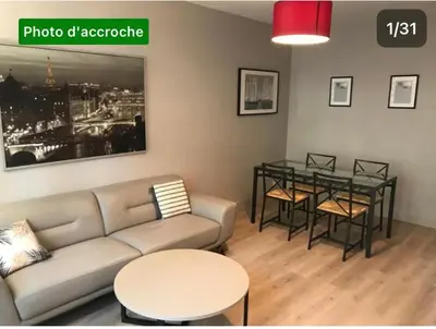 Coin salon dans l'établissement Luxueux pavillon grande suites familiales 4 Pax avec grand jardin et balcon