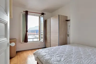 Un ou plusieurs lits dans un hébergement de l'établissement Cocon calme et lumineux - Clichy