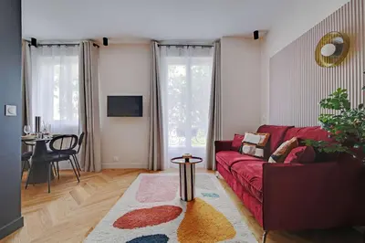 Coin salon dans l'établissement Beautiful apartment near the Eiffel Tower