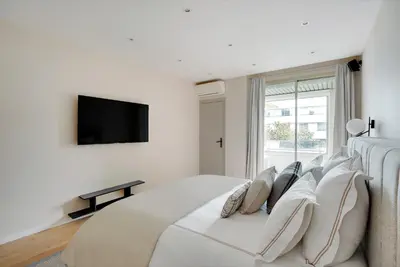 Télévision ou salle de divertissement dans l'établissement Suite Familiale à Victor Hugo