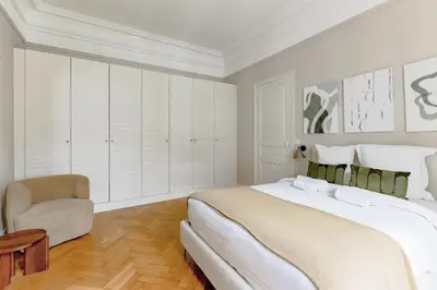 Un ou plusieurs lits dans un hébergement de l'établissement Grand appartement luxe - Trocadéro