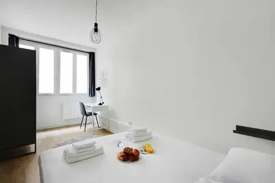 Un ou plusieurs lits dans un hébergement de l'établissement A0# Republic # Marais # 1BedRoom # Paris03 # AC