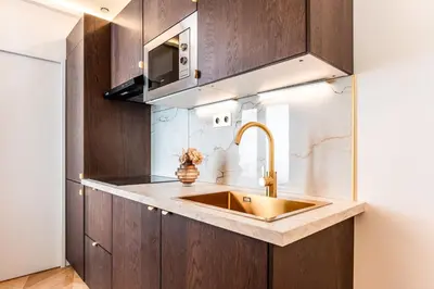 Cuisine ou kitchenette dans l'établissement Appartement d'exception avec Jacuzzi et AC - 6P