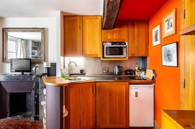 Cuisine ou kitchenette dans l'établissement GuestReady - Discover the Charm of Paris