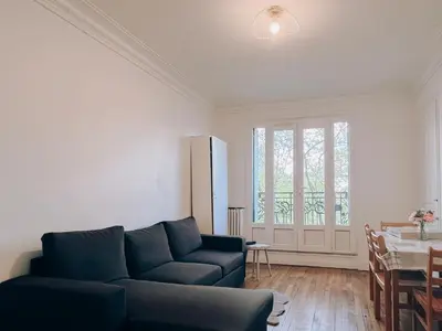 Coin salon dans l'établissement Appartement A deux pas de Gare de Lyon