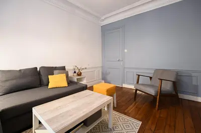 Coin salon dans l'établissement GuestReady - Charm an Comfort in Épinettes