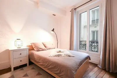 Un ou plusieurs lits dans un hébergement de l'établissement GuestReady - Charm an Comfort in Épinettes