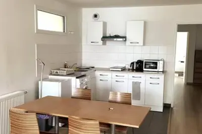 Cuisine ou kitchenette dans l'établissement Nid douillet pour 6p - St Denis *