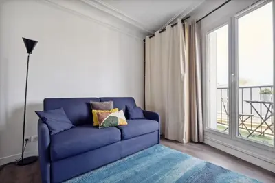 Coin salon dans l'établissement Amazing view apartment in heart of Paris