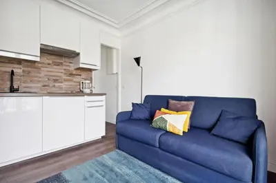 Coin salon dans l'établissement Amazing view apartment in heart of Paris