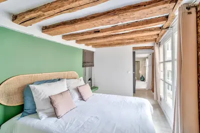 Un ou plusieurs lits dans un hébergement de l'établissement GuestReady - Elegant 2BR Ap in Saint-Martin