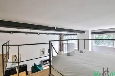Un ou plusieurs lits dans un hébergement de l'établissement Castex - LB - Beautiful apartment near Le Marais for four people