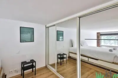 Un ou plusieurs lits dans un hébergement de l'établissement Castex - LB - Beautiful apartment near Le Marais for four people
