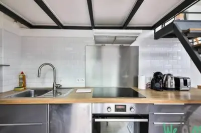 Cuisine ou kitchenette dans l'établissement Castex - LB - Beautiful apartment near Le Marais for four people