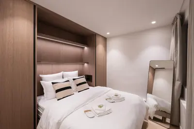 Un ou plusieurs lits dans un hébergement de l'établissement 2BR Apt with AC - ideal nest for families