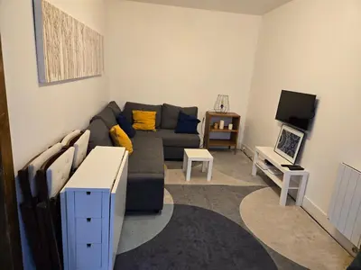 Télévision ou salle de divertissement dans l'établissement Écrin au cœur de Paris