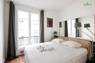 Un ou plusieurs lits dans un hébergement de l'établissement Saint Benoît - KP - Lovely Apartment in St Germain-des-Prés for 4p