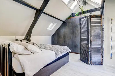 Un ou plusieurs lits dans un hébergement de l'établissement Love House - Maison entière et son jardin - Rare à Paris