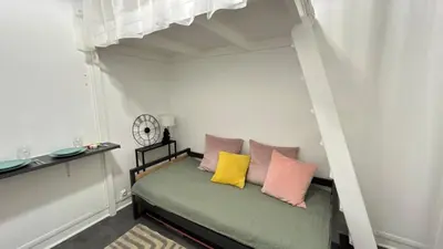 Coin salon dans l'établissement Cozy studio in Paris 15eme