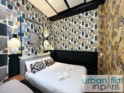 Un ou plusieurs lits dans un hébergement de l'établissement Urban Flat 31 - Lovely Triplex in Paris