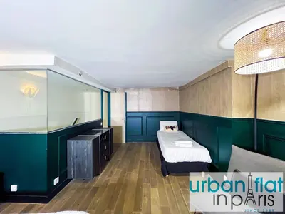Un ou plusieurs lits dans un hébergement de l'établissement Urban Flat 31 - Lovely Triplex in Paris