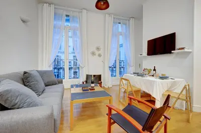 Coin salon dans l'établissement 5013 Kleber Suite - Suite near Arc de Triomphe