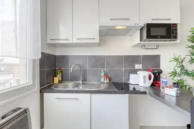 Cuisine ou kitchenette dans l'établissement Hyper Centre Villejuif à côté du M7 proche de Paris
