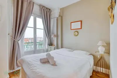 Un ou plusieurs lits dans un hébergement de l'établissement Le Boursault - Stunning Penthouse, Terrace, Parking