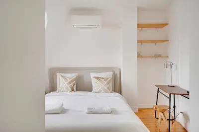 Un ou plusieurs lits dans un hébergement de l'établissement Loft d'exception Courcelles - parc Monceau
