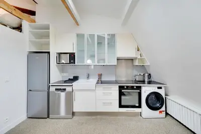 Cuisine ou kitchenette dans l'établissement Loft d'exception Courcelles - parc Monceau