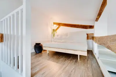 Un ou plusieurs lits dans un hébergement de l'établissement Loft d'exception Courcelles - parc Monceau
