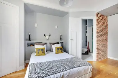 Un ou plusieurs lits dans un hébergement de l'établissement Elegant 2 pièces moderne - rue du Colisée