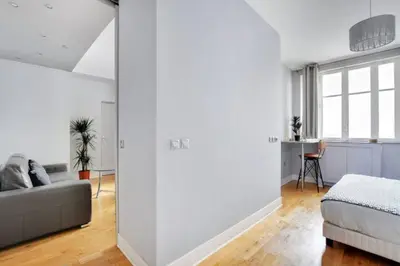 Coin salon dans l'établissement Elegant 2 pièces moderne - rue du Colisée