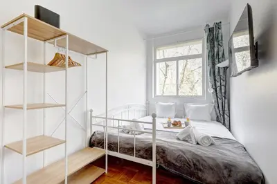 Un ou plusieurs lits dans un hébergement de l'établissement 511 Suite Suchet - Cosy studio in Paris 16th