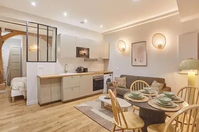 Cuisine ou kitchenette dans l'établissement Superb apartment 1 bedroom Center of Paris by Studio Prestige