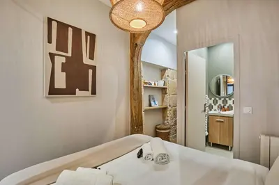 Un ou plusieurs lits dans un hébergement de l'établissement Superb apartment 1 bedroom Center of Paris by Studio Prestige