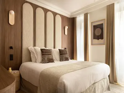 Un ou plusieurs lits dans un hébergement de l'établissement Elegant appt- AC-2BR-6P- Musée du Louvre
