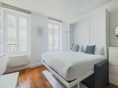 Un ou plusieurs lits dans un hébergement de l'établissement Charming apartment-1BR-3P-Ternes