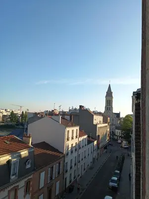 Vue générale sur Saint-Ouen ou vue de la ville depuis le séjour chez l'habitant