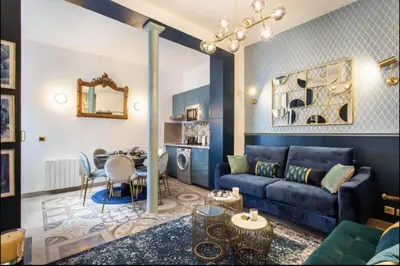 Coin salon dans l'établissement Charming 2BR # Grands Boulevards