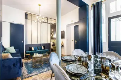 Coin salon dans l'établissement Charming 2BR # Grands Boulevards