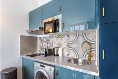 Cuisine ou kitchenette dans l'établissement Charming 2BR # Grands Boulevards