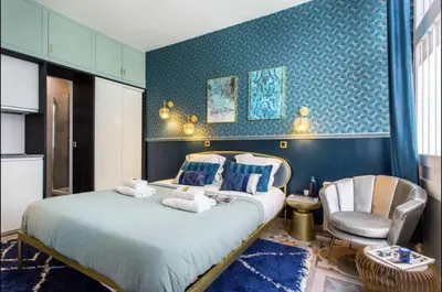 Un ou plusieurs lits dans un hébergement de l'établissement Charming 2BR # Grands Boulevards
