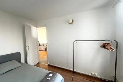 Un ou plusieurs lits dans un hébergement de l'établissement Bel appartement à Deux Pas du Canal Saint-Martin Métro 11-5-8