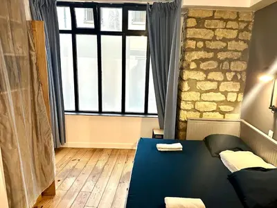 Un ou plusieurs lits dans un hébergement de l'établissement HSH - LE CHAPELAIS CLICHY MONTMARTe