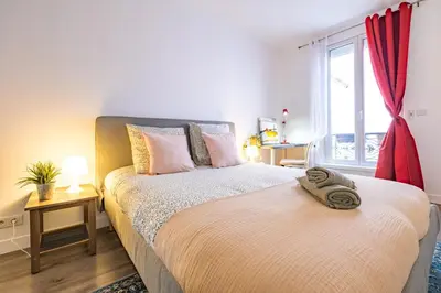 Un ou plusieurs lits dans un hébergement de l'établissement Appartement Place Monge 3 Guests